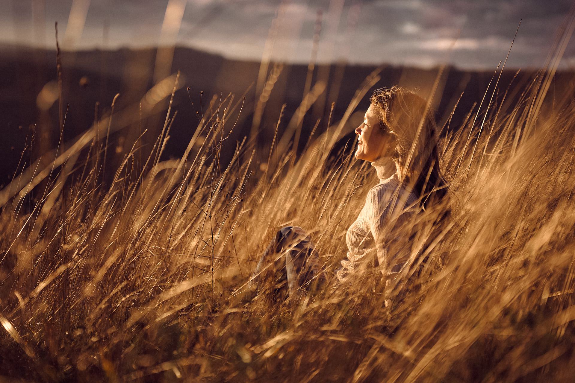 person relaxing by the water